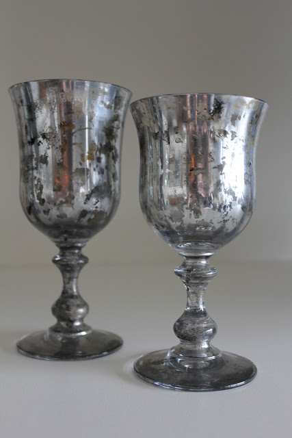 two mercury glass goblets