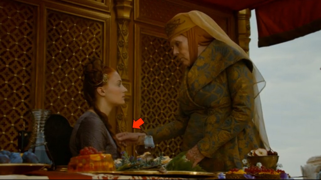 Olenna Tyrell takes poison from Sansa Stark