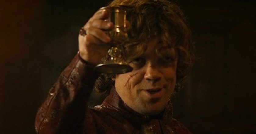 tyrion lannister raises a glass of wine