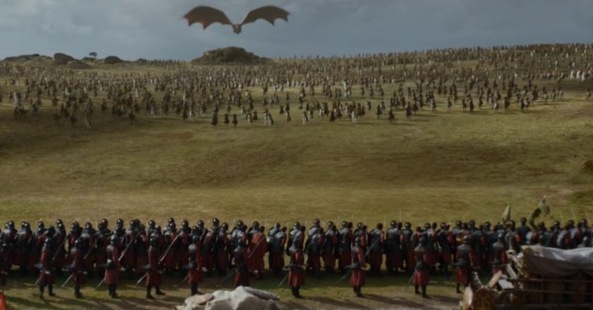 two armies clash and one has a dragon